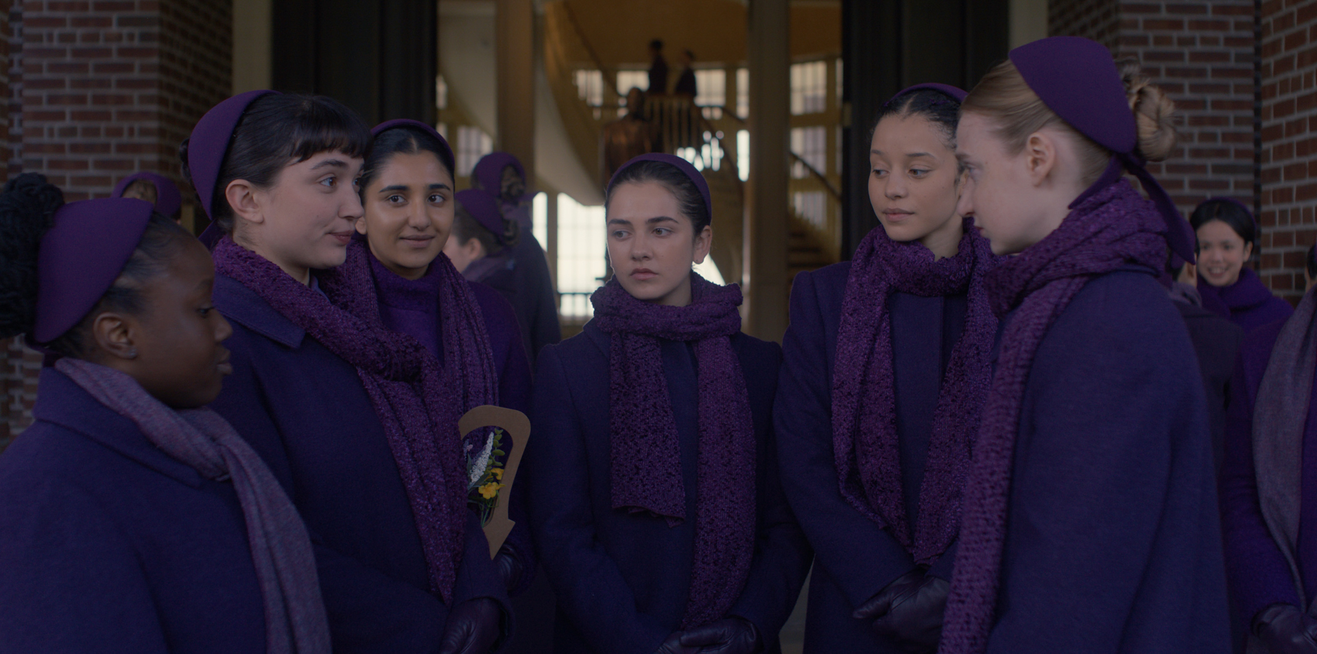 Several characters from “The Testaments" on Hulu