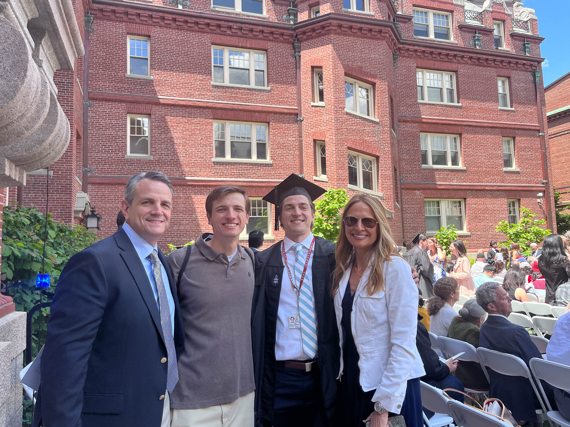 Harvard College graduate Joseph Periello with family members before the 2026 diploma ceremony at Adams House