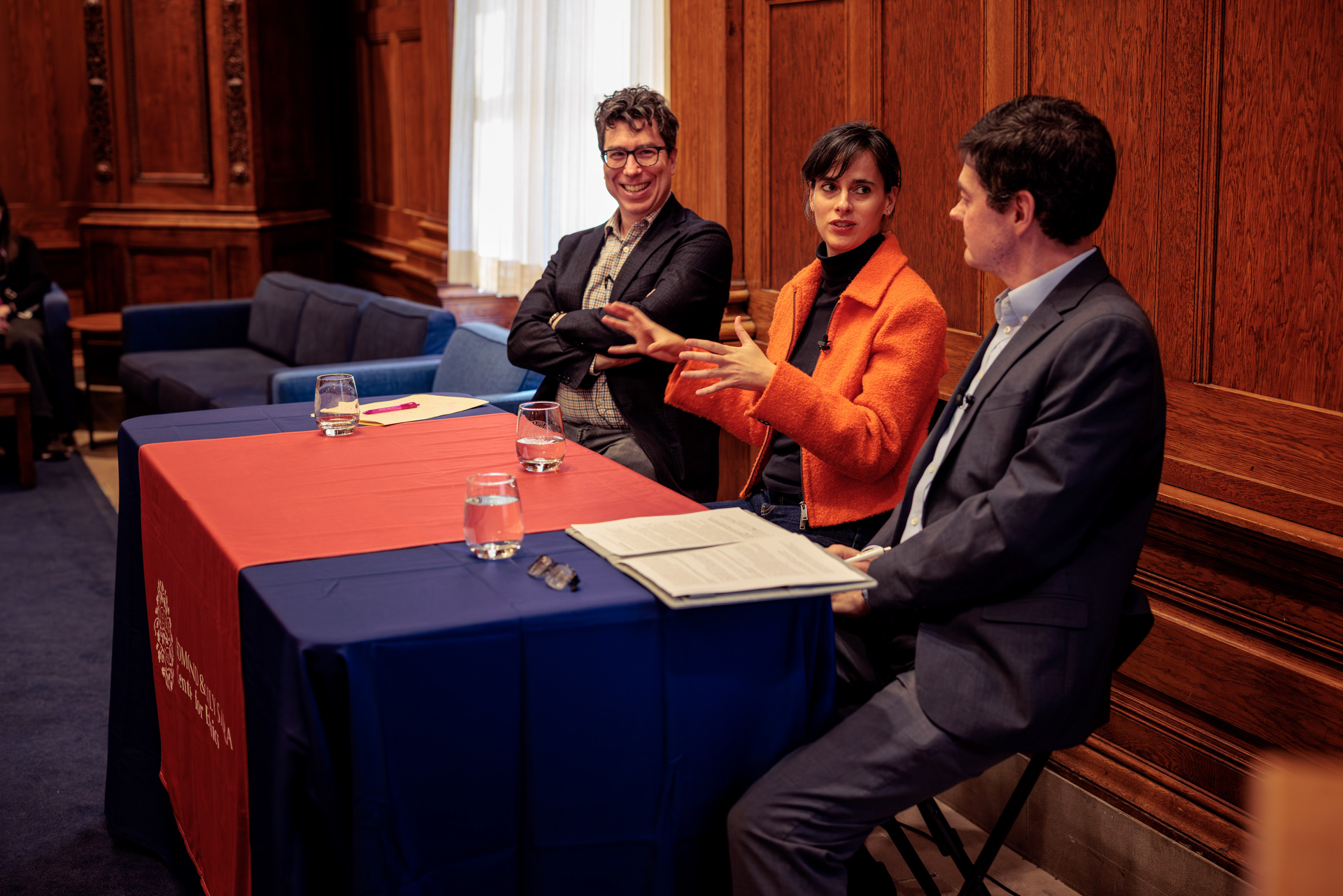 A Harvard University panel conversation about artificial intelligence featured, from left, Professor Jonathan Zittrain, Professor Carissa Véliz, and Professor Eric Beerbohm
