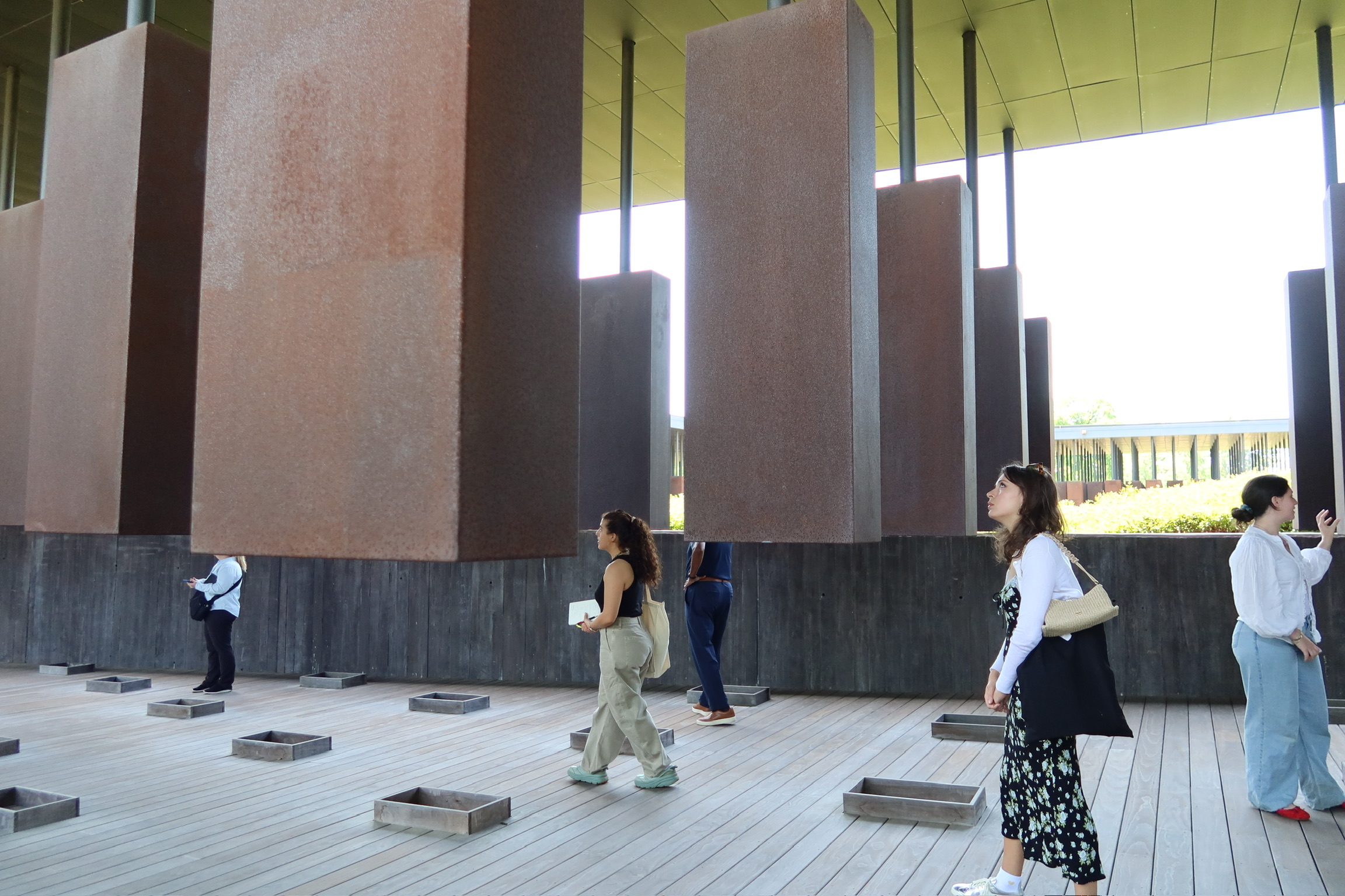 Students walk through the National Memorial to Peace and Justice in Montgomery, Ala.