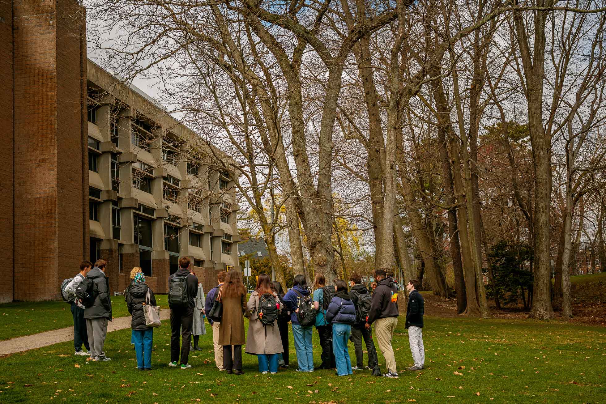 Students outside the Center for Astrophysics in early spring