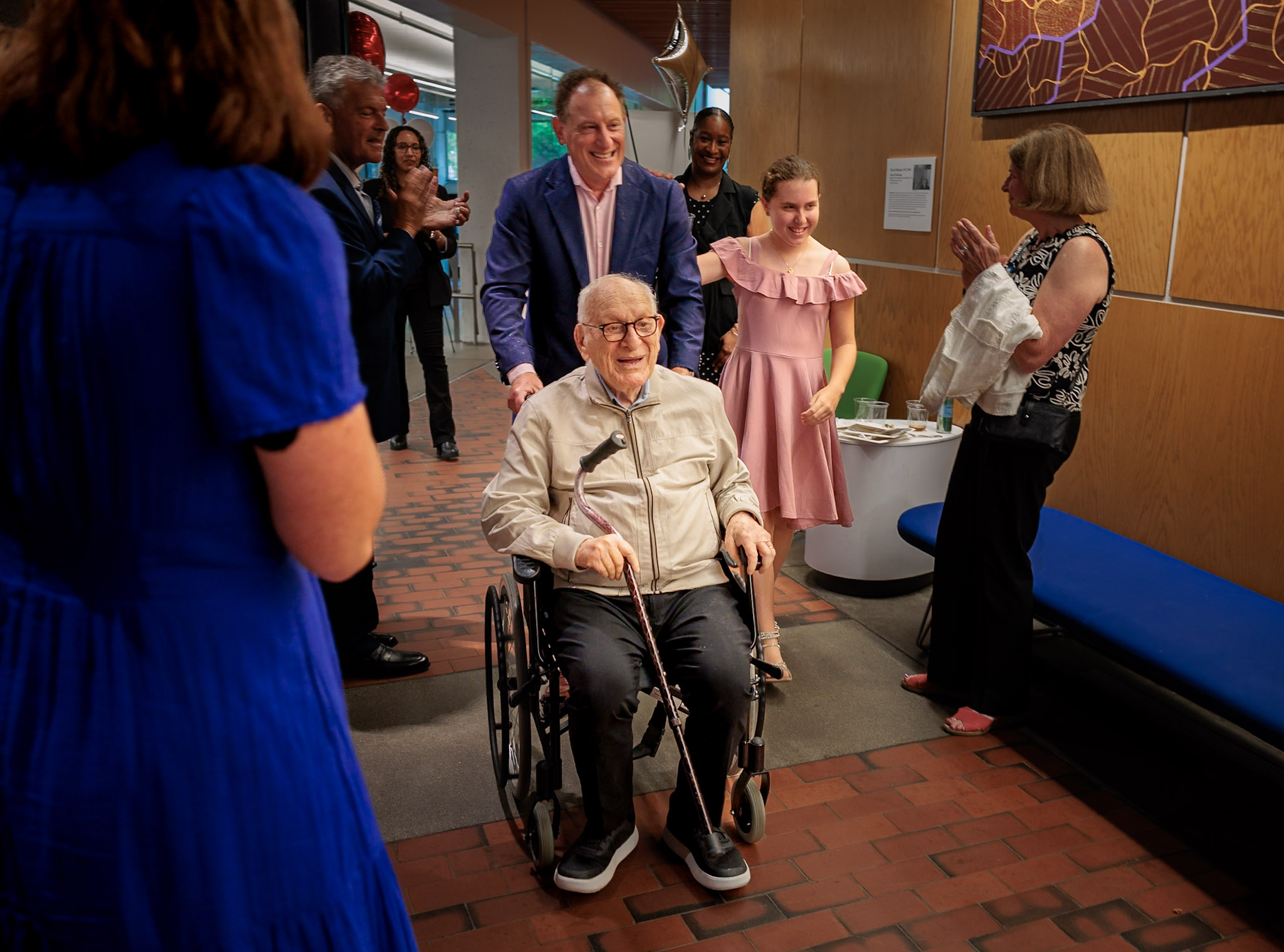 David Bakalar was wheeled into a June 23 reception at Harvard University's Science Center by his son Steven.