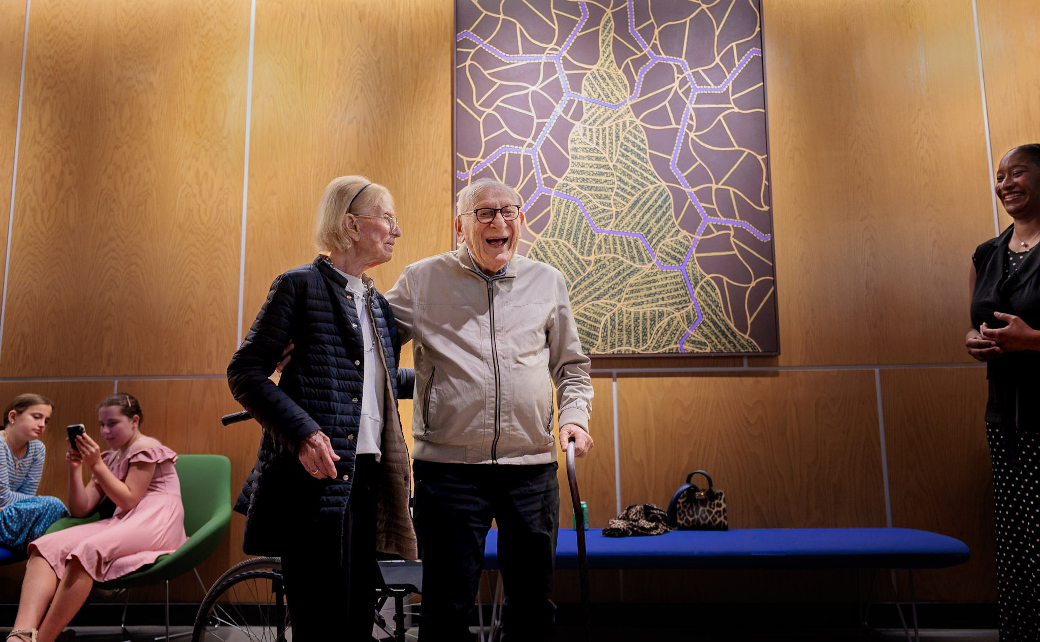 David Bakalar and his wife, Sandra, posed for photos before his artwork at Harvard University’s Zimmer Hall.