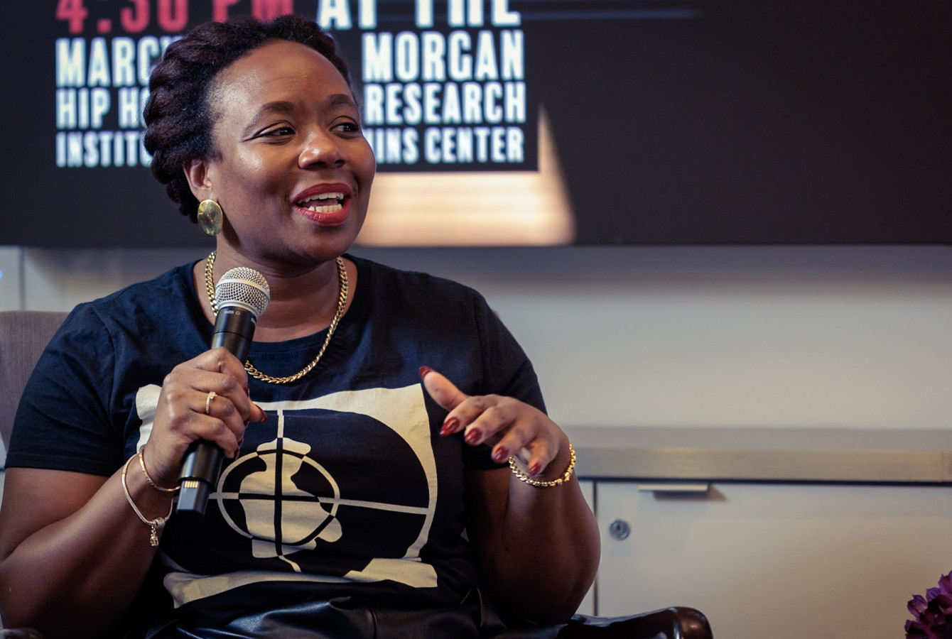 Alta Mauro, Associate Dean of Culture & Community, is seen speaking during an event with Flavor Flav at Harvard University’s Marcyliena H. Morgan Hip Hop Archive & Research Institute.