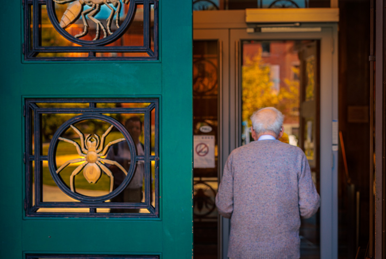 From the back, Rich Losick entering the Bio Labs through the front doors