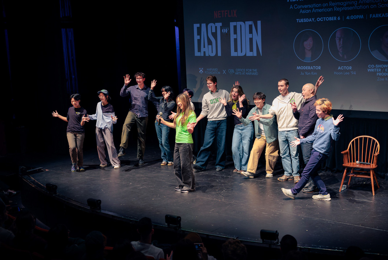 Hoon Lee with the Harvard Din & Tonics, an a capella group, singing on stage
