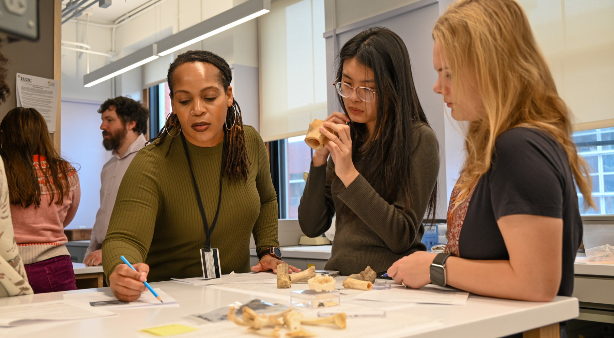 Professor Shayla Monre, graduate student Meting Song, and undergraduate Nina Skov Jensen in the Zooarchaeology Lab at Harvard University