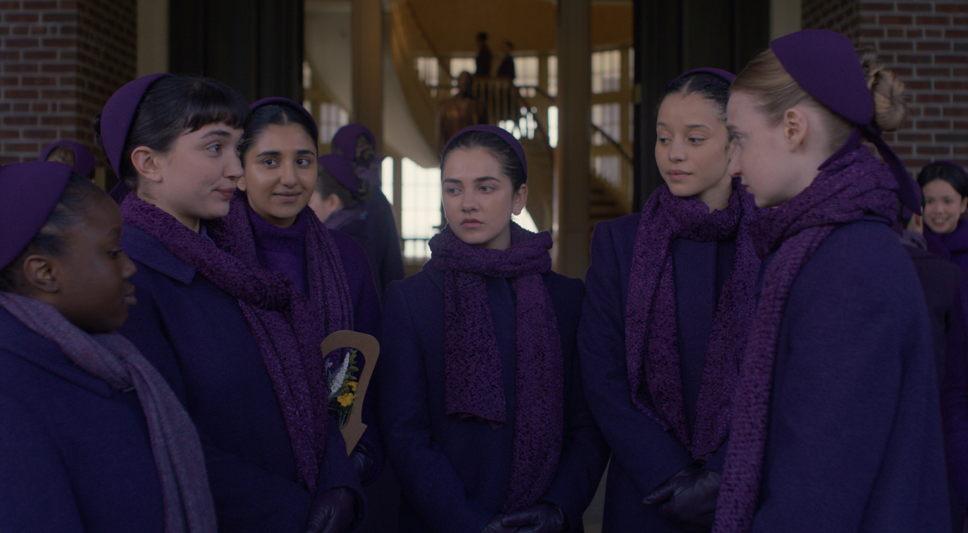 Several characters from “The Testaments" on Hulu