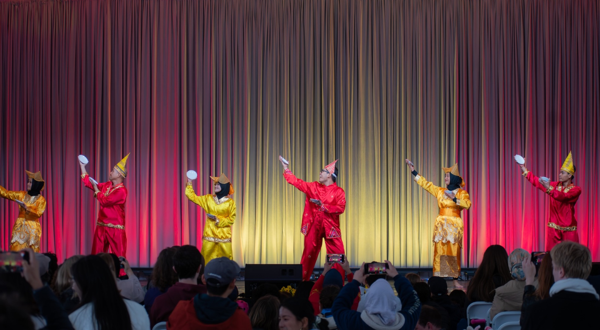 Boston Cendrawasih, an Indonesian dance group featuring graduate students from Harvard, MIT, Tufts, and BU, performed in bright red and yellow costumes.
