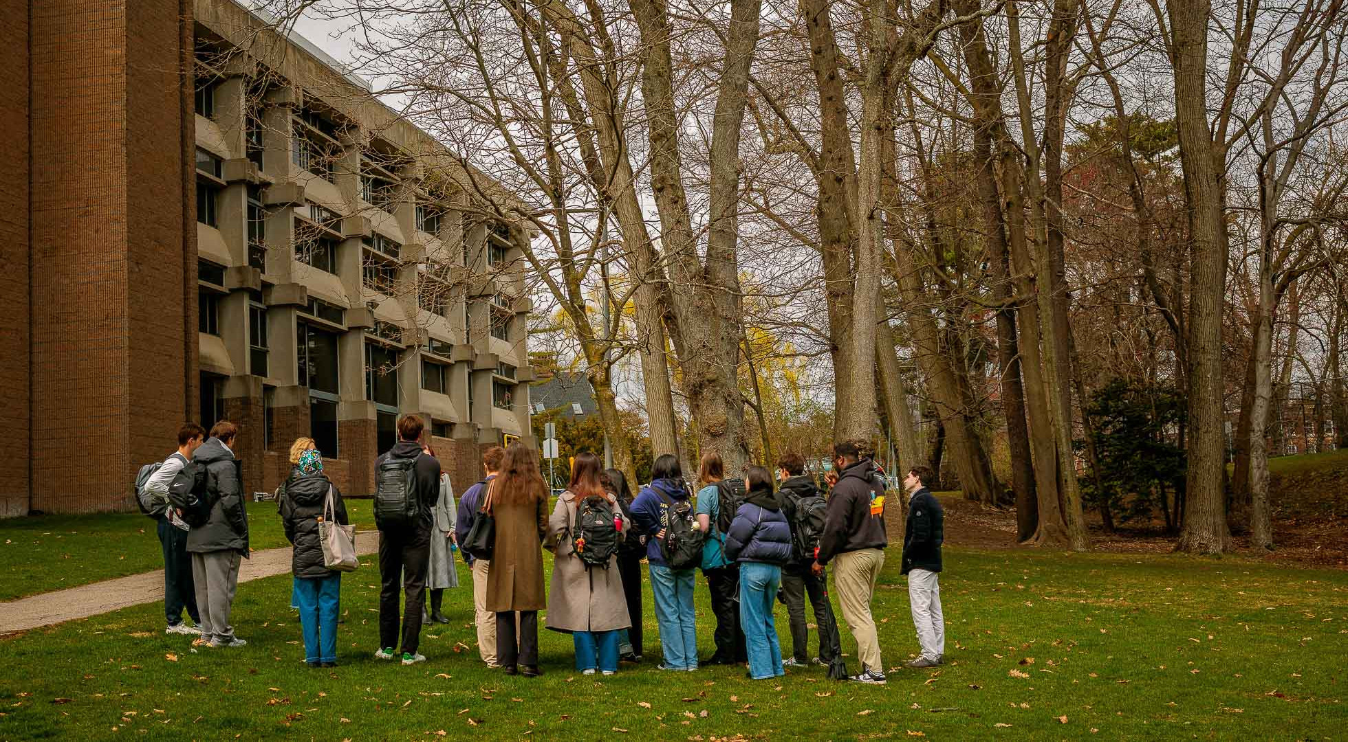 Students outside the Center for Astrophysics in early spring