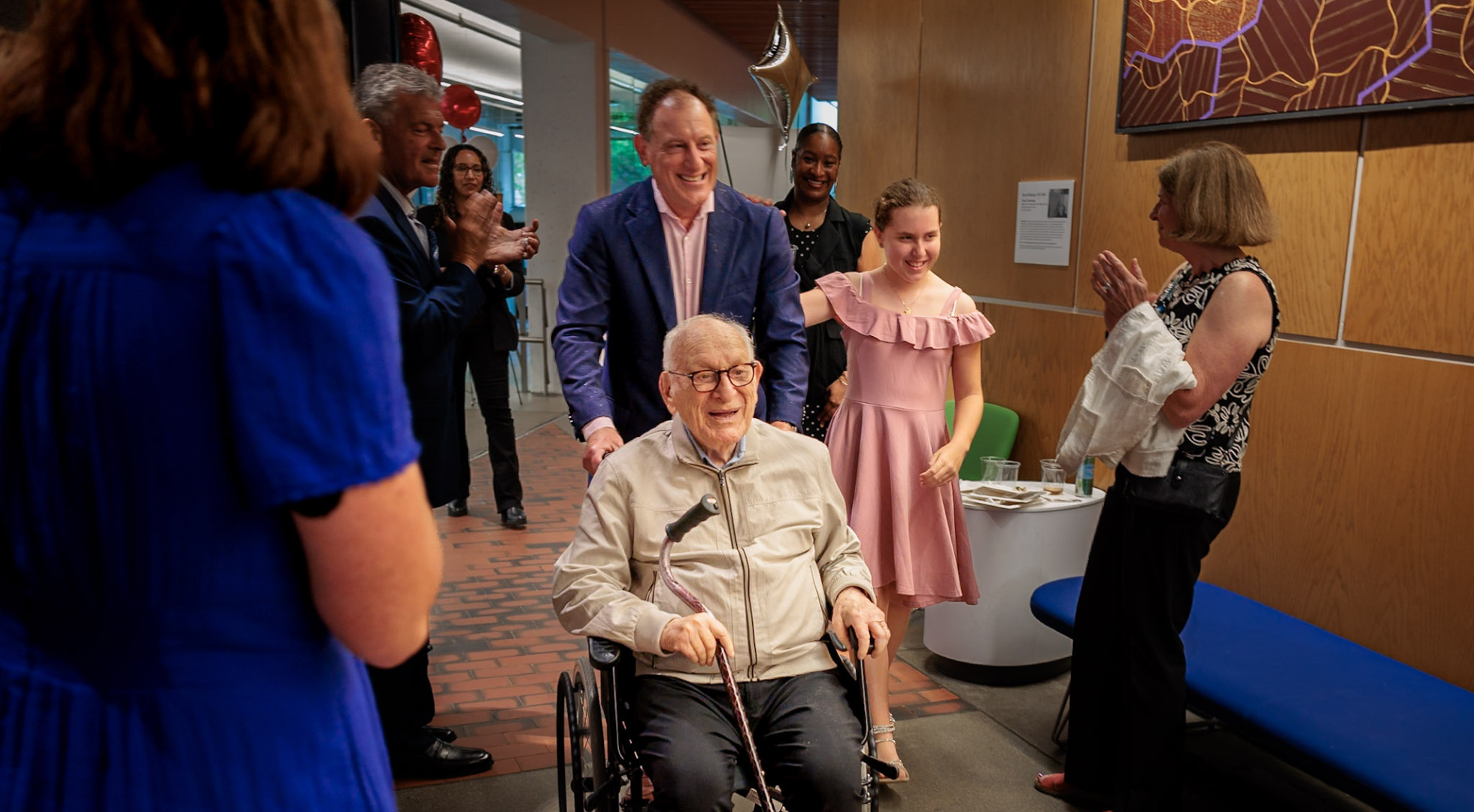 David Bakalar was wheeled into a June 23 reception at Harvard University's Science Center by his son Steven.