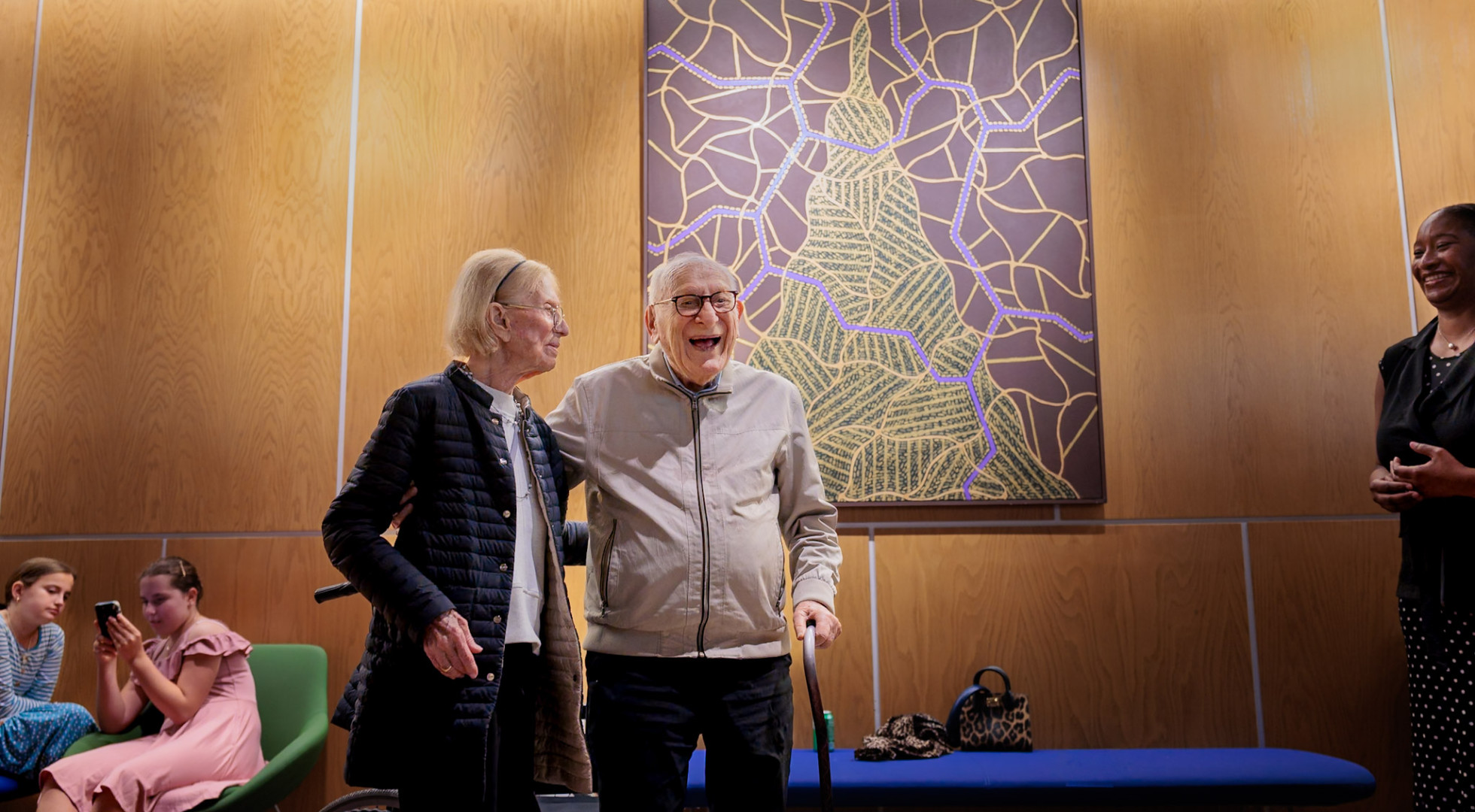 David Bakalar and his wife, Sandra, posed for photos before his artwork at Harvard University’s Zimmer Hall.
