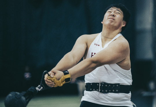 Daniel Ye competing in weight throwing