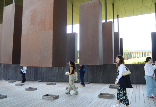 Students walk through the National Memorial to Peace and Justice in Montgomery, Ala.