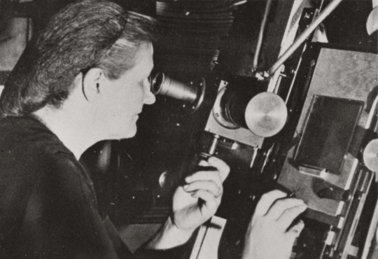 Harvard astronomer Cecilia Payne-Gaposchkin peering into a telescope, circa 1956