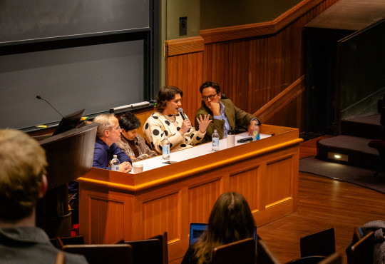 A panel of academics featuring Justin Smith-Ruiu Doris Sommer, Madeline Baker, and moderator Ian Corbin