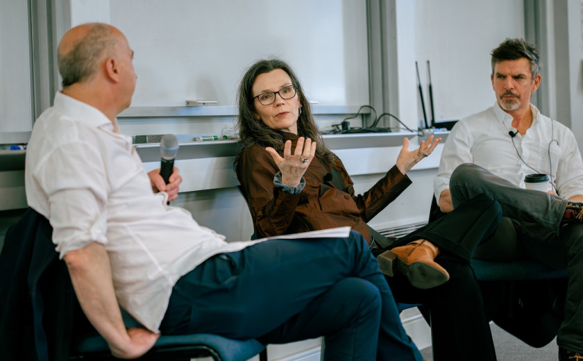 From left, Harvard University Professor of the Practice James Wood, Tufts University's Hilary Binda, and Atlantic columnist James Parker appear at the front of a classroom.