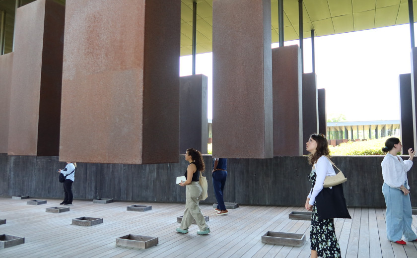 Students walk through the National Memorial to Peace and Justice in Montgomery, Ala.