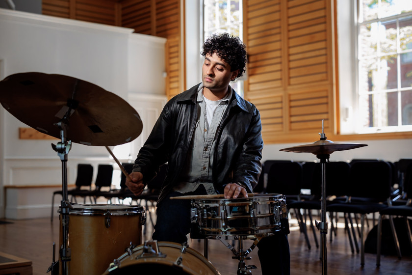 Raghav Mehrotra ’26 plays the drums at Holden Chapel