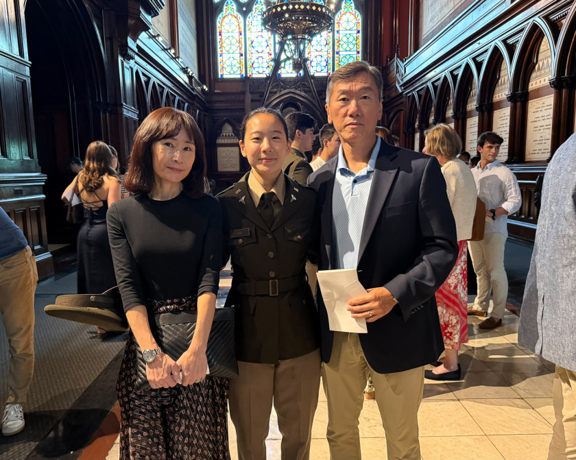 Zoe Kim flanked by her parents at Sanders Theatre