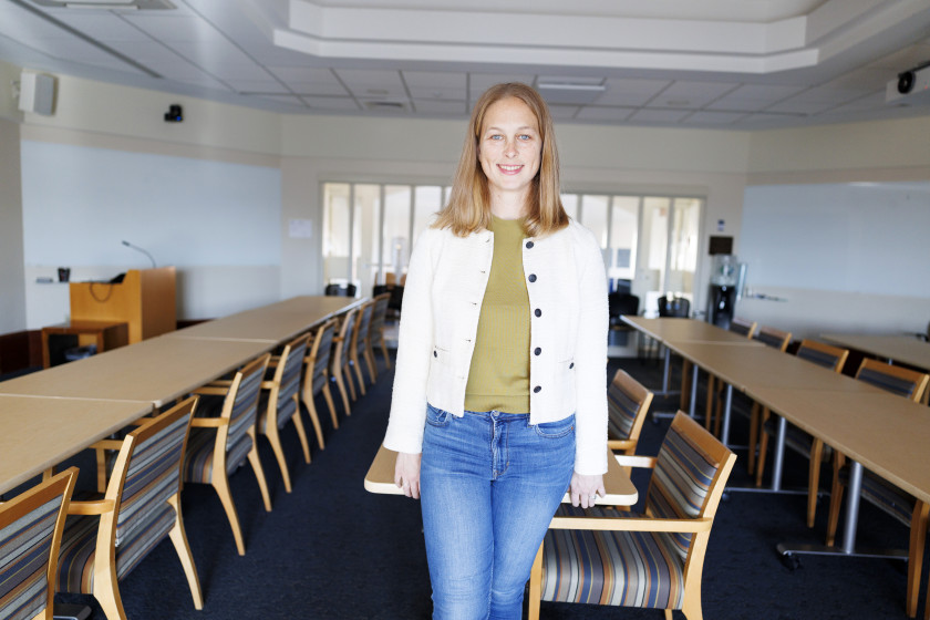 Rebecca Diamond standing in a classroom