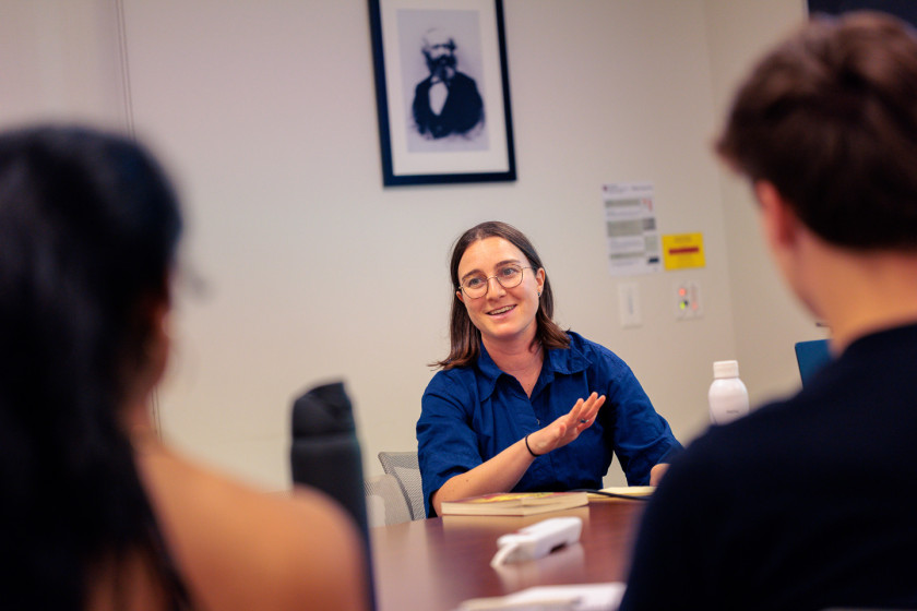 Anna Russo, assistant professor of economics and social studies, in a classroom discussion with students